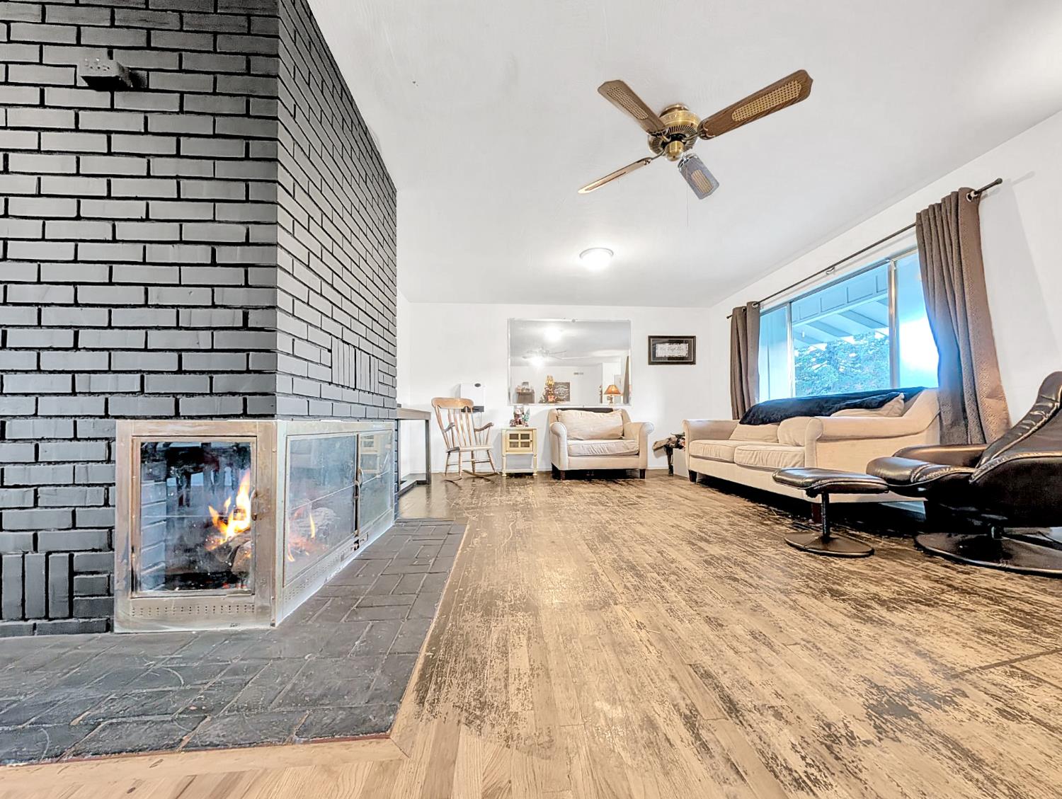 600 Gold Oak Road San Andreas, CA 95249 - Photo 14 of 46 a living room with furniture and a fireplace