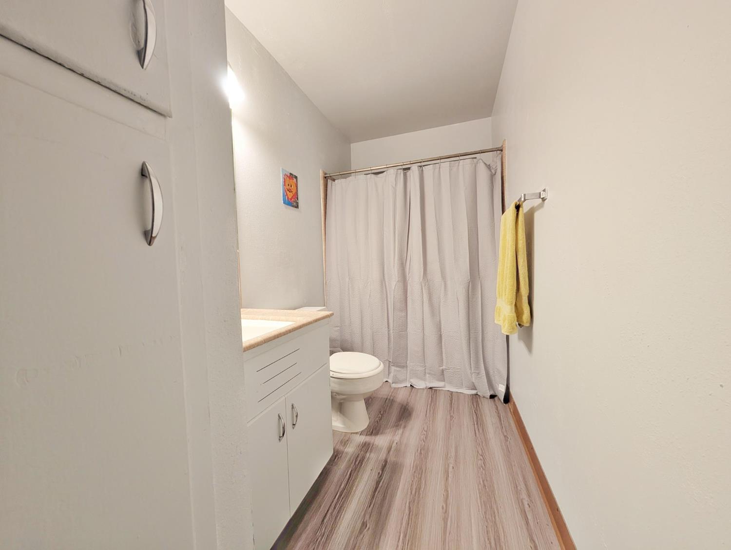 600 Gold Oak Road San Andreas, CA 95249 - Photo 36 of 46 a bathroom with a toilet a sink and a shower