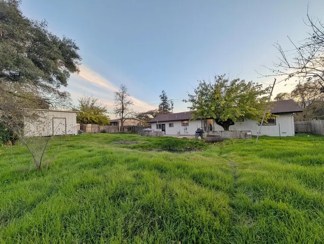 a view of a house with a big yard
