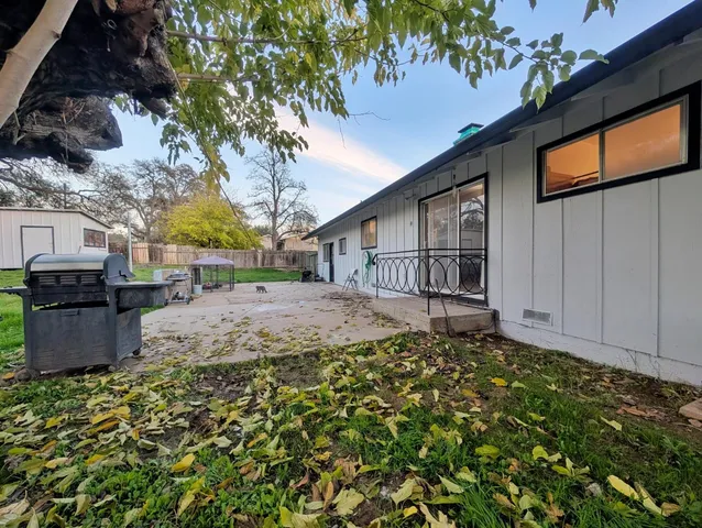a backyard of a house with lots of green space