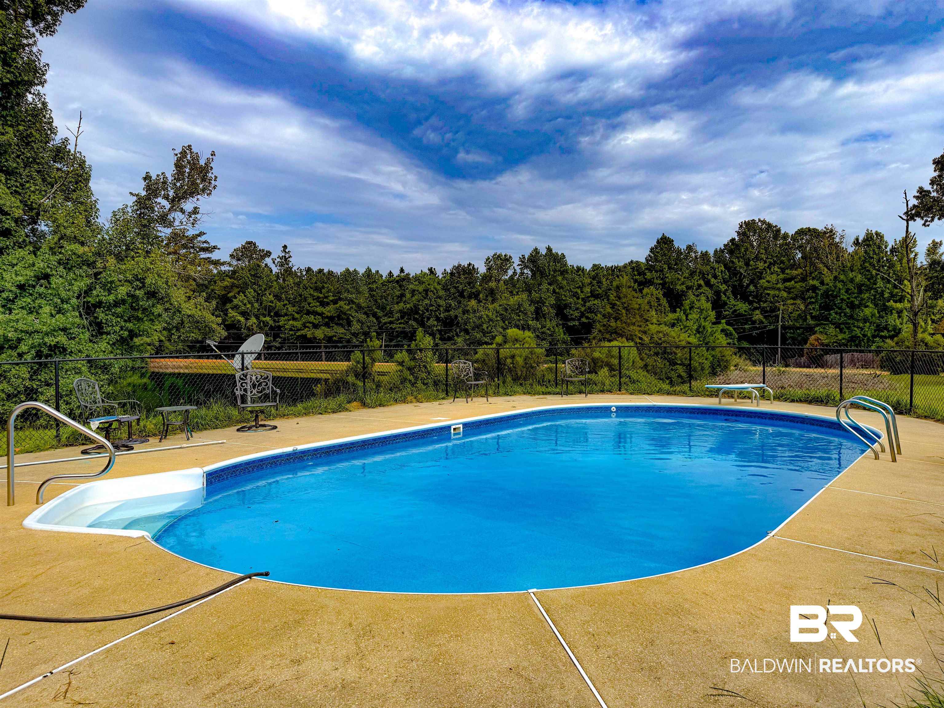534 Buddy Lake Road Brewton, AL 36426 - Photo 4 of 32 View of pool featuring a patio and a diving board