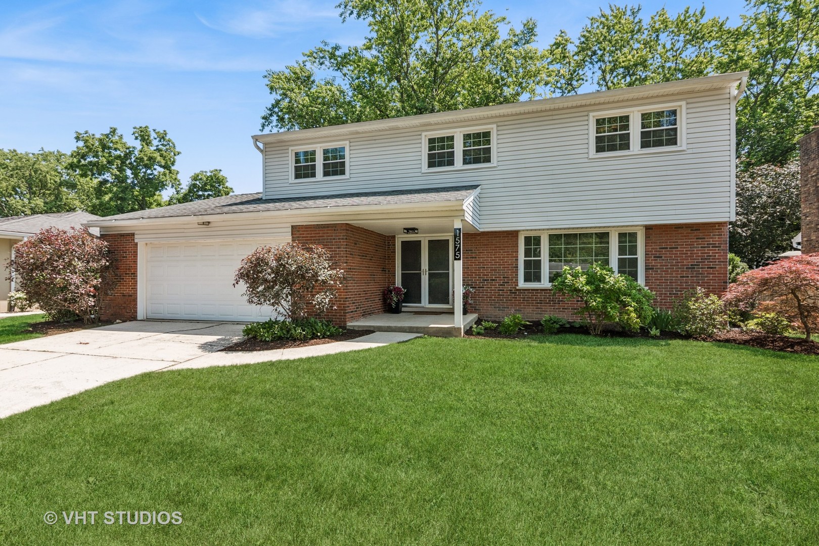 a view of a house with a garden
