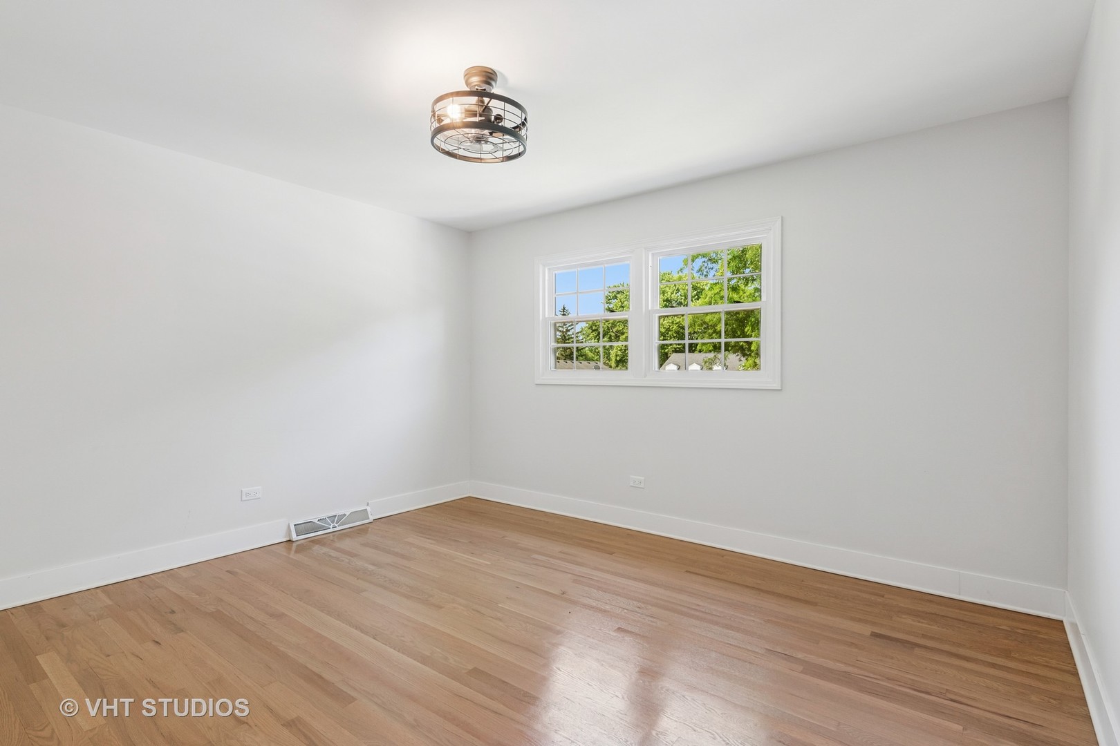 1575 Burning Trail Wheaton, IL 60189 - Photo 18 of 34 a view of room with window and hardwood floor
