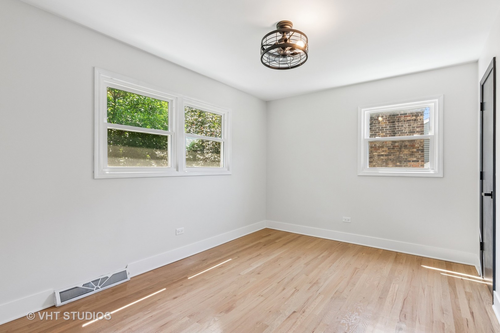 1575 Burning Trail Wheaton, IL 60189 - Photo 20 of 34 a view of a room with wooden floor and window