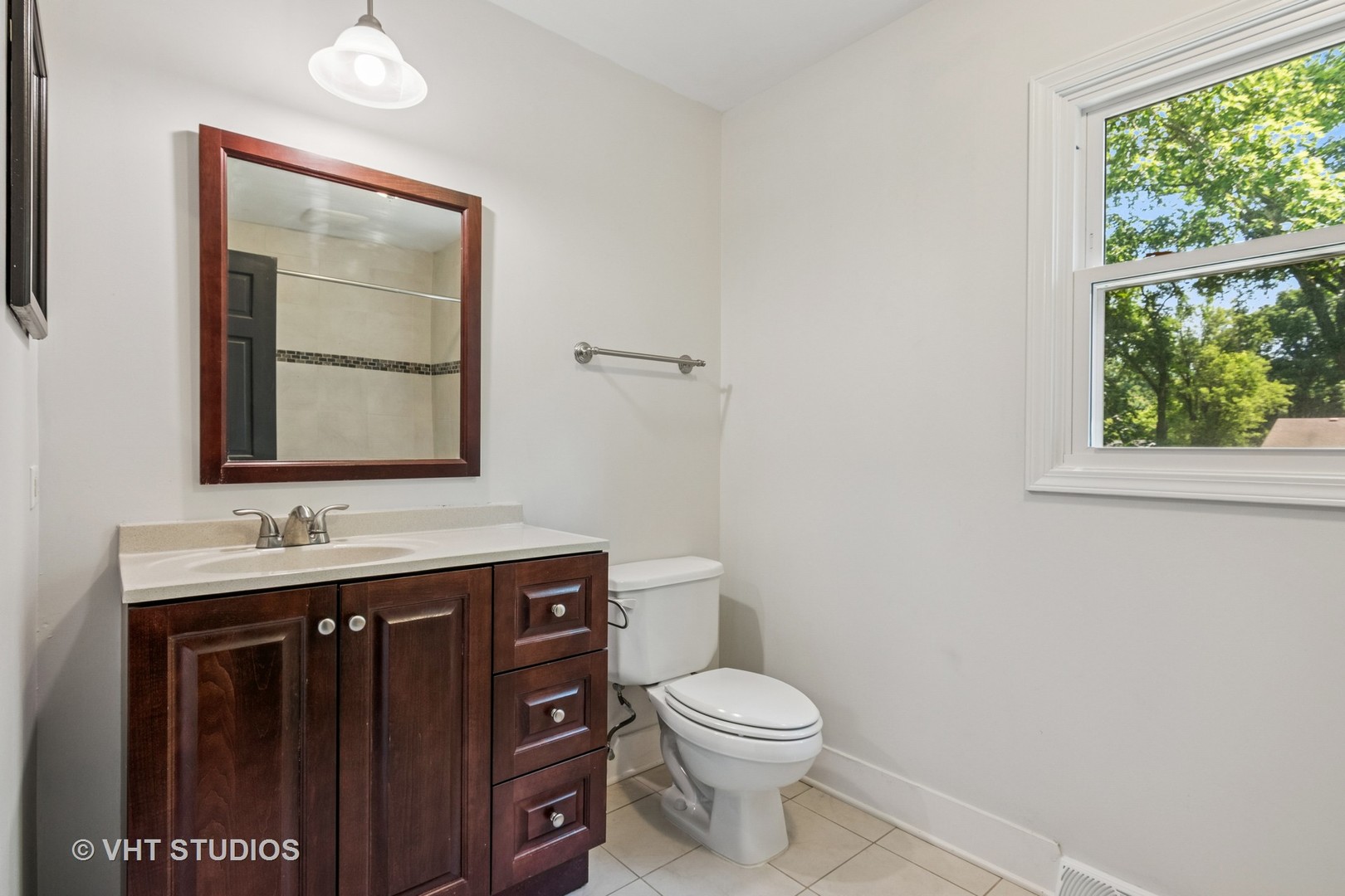 1575 Burning Trail Wheaton, IL 60189 - Photo 21 of 34 a bathroom with a toilet sink and mirror