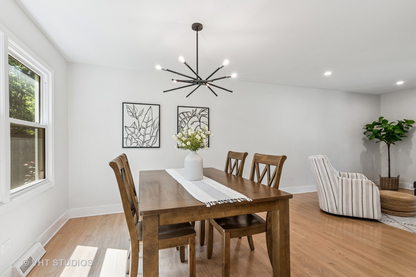 1575 Burning Trail Wheaton, IL 60189 - Photo 8 of 34 a view of a dining room with furniture and wooden floor