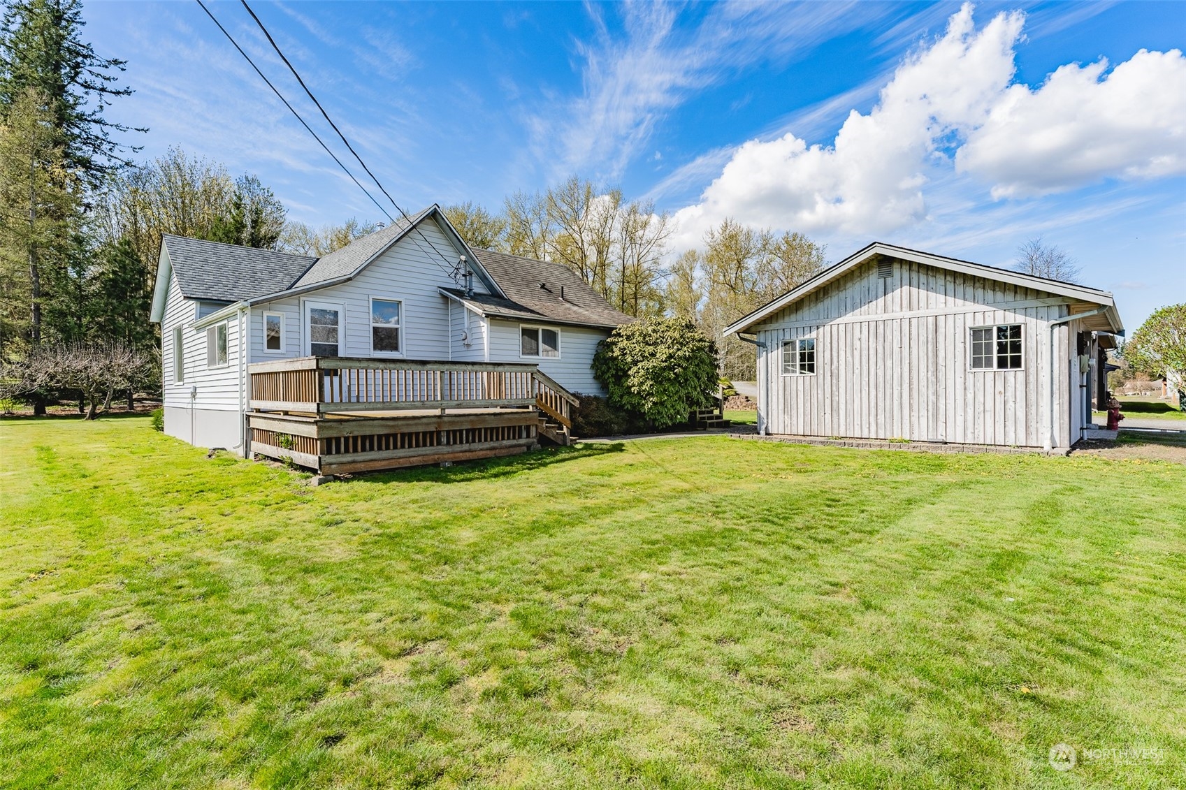 940 West Axton Road Ferndale, WA 98248 - Photo 19 of 40 a view of a house with backyard and garden