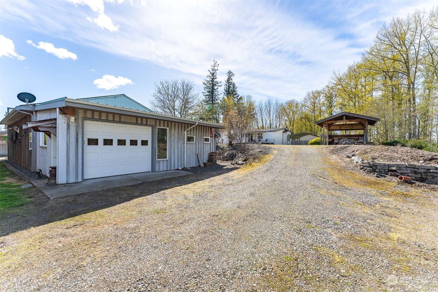 940 West Axton Road Ferndale, WA 98248 - Photo 28 of 40 a view of a house with a snow in the background