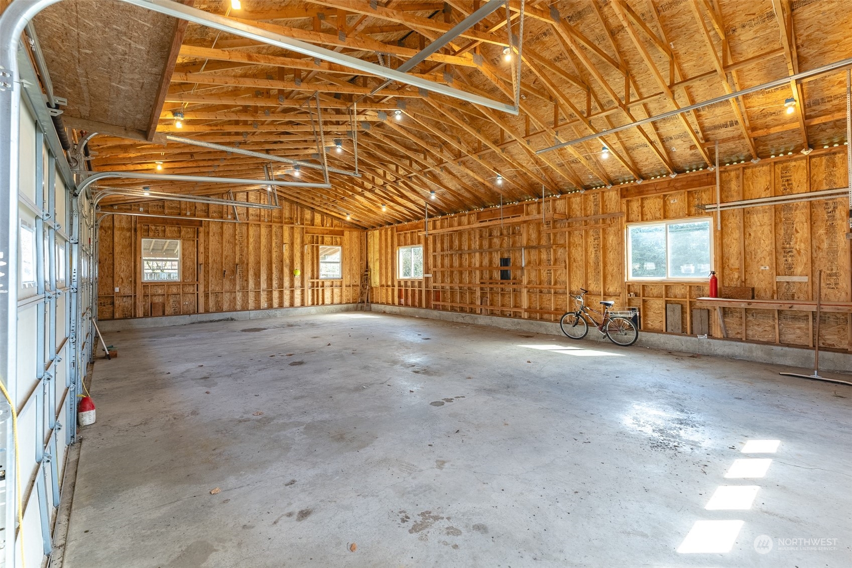 940 West Axton Road Ferndale, WA 98248 - Photo 30 of 40 a view of empty room with wooden floor