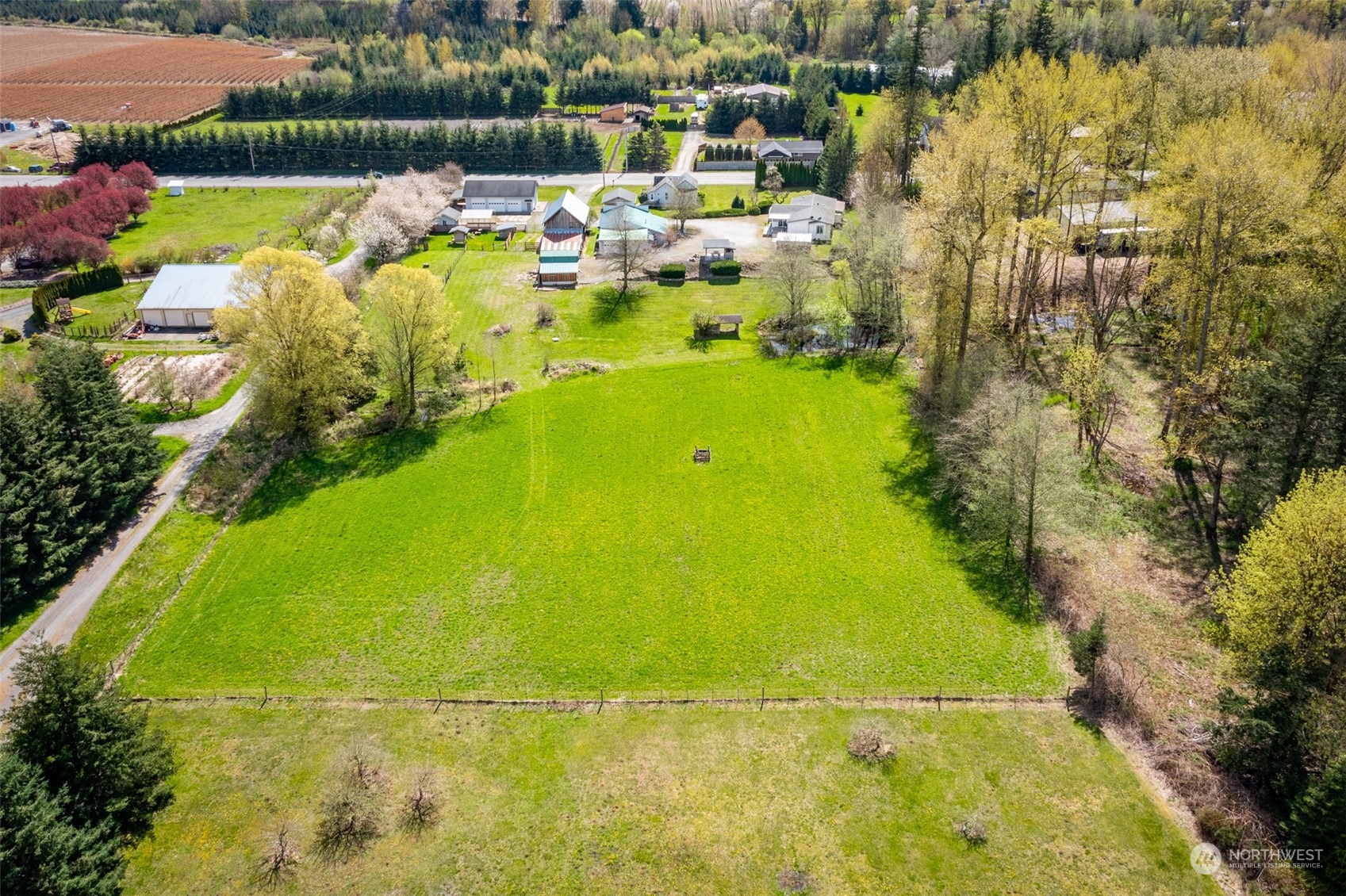 940 West Axton Road Ferndale, WA 98248 - Photo 38 of 40 a view of a lake with a houses