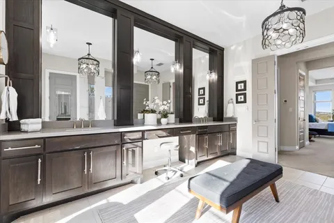 a view of a patio with a table and chairs