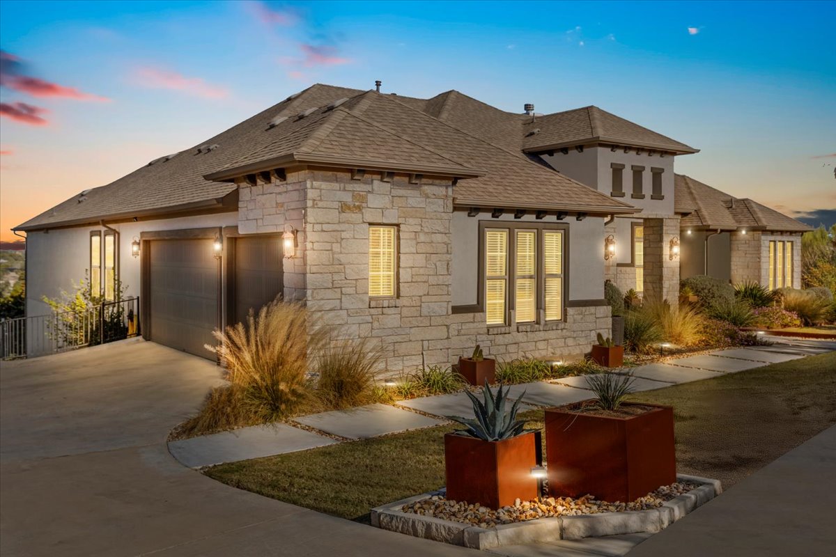 17825 Windecker Cove Dripping Springs, TX 78620 - Photo 3 of 39 a front view of house with yard