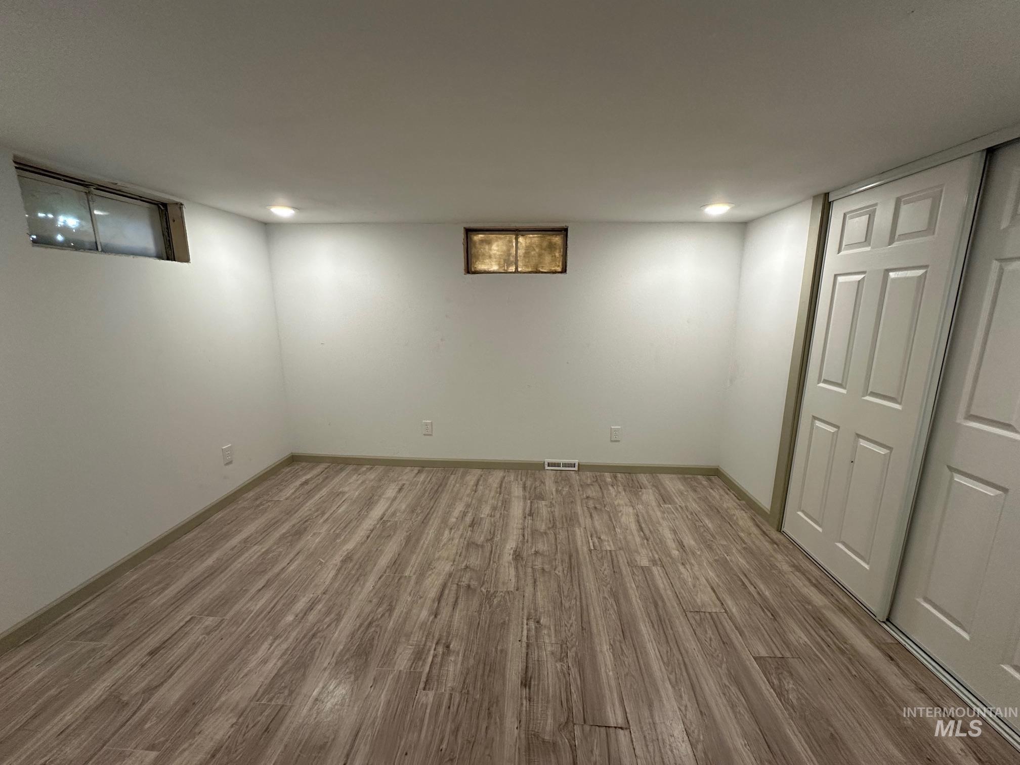 264 Southwest 10th Avenue Ontario, OR 97914 - Photo 14 of 26 Finished basement with wood finished floors and recessed lighting