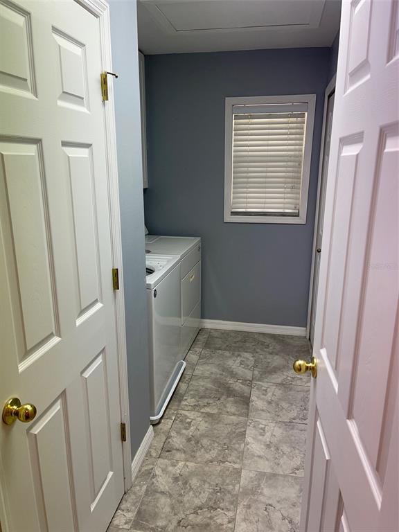 6412 Rosefinch Court, Unit 201 Lakewood Ranch, FL 34202 - Photo 11 of 14 a view of an empty room with a window