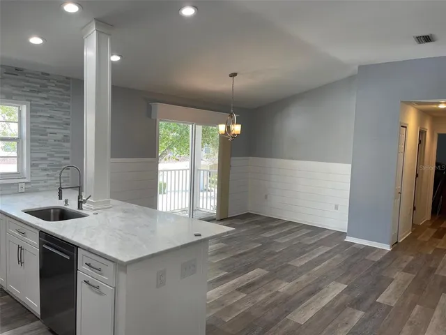 a bathroom with a shower and toilet
