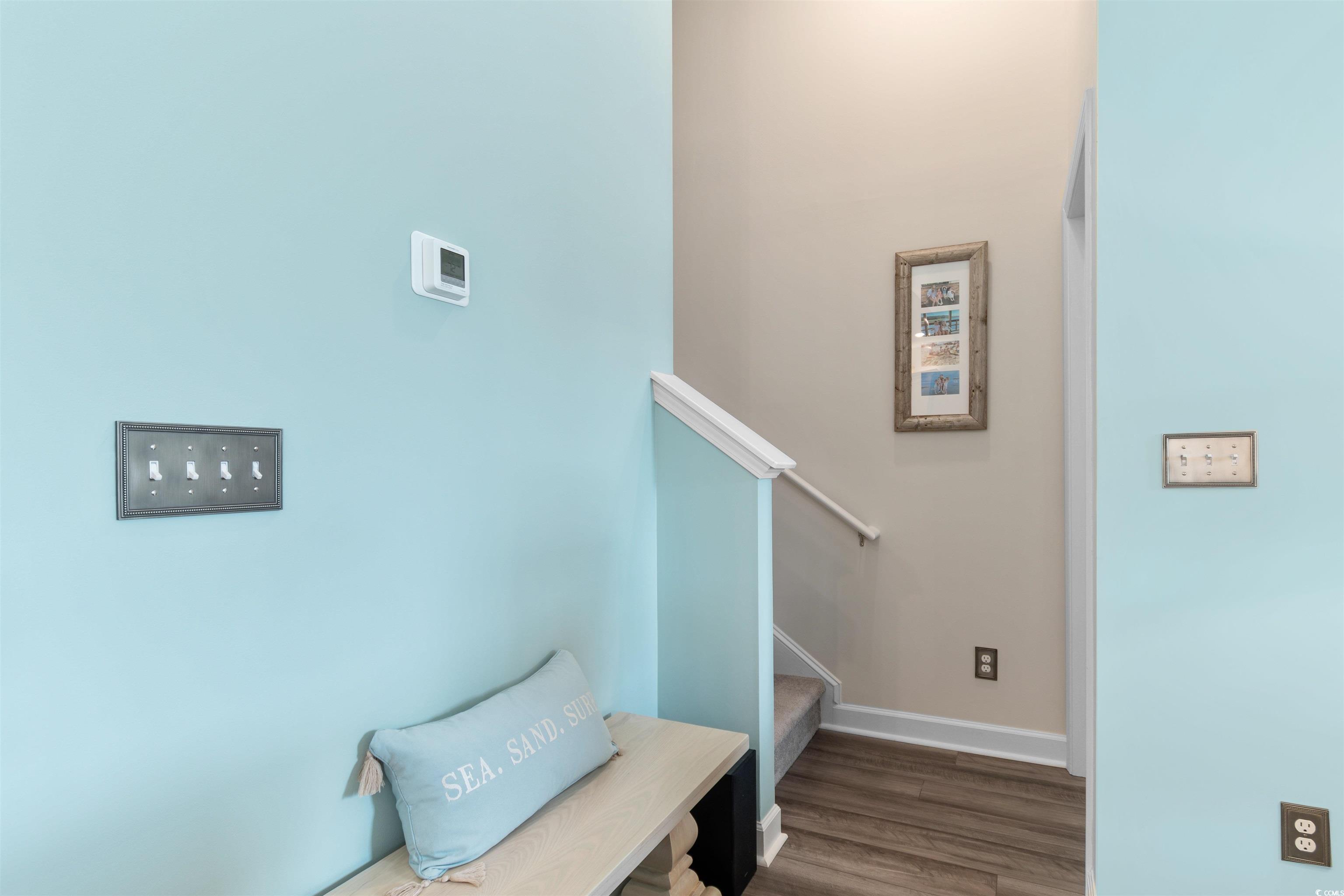 240 Sundew Loop Little River, SC 29566 - Photo 22 of 40 Mudroom featuring wood finished floors and baseboards