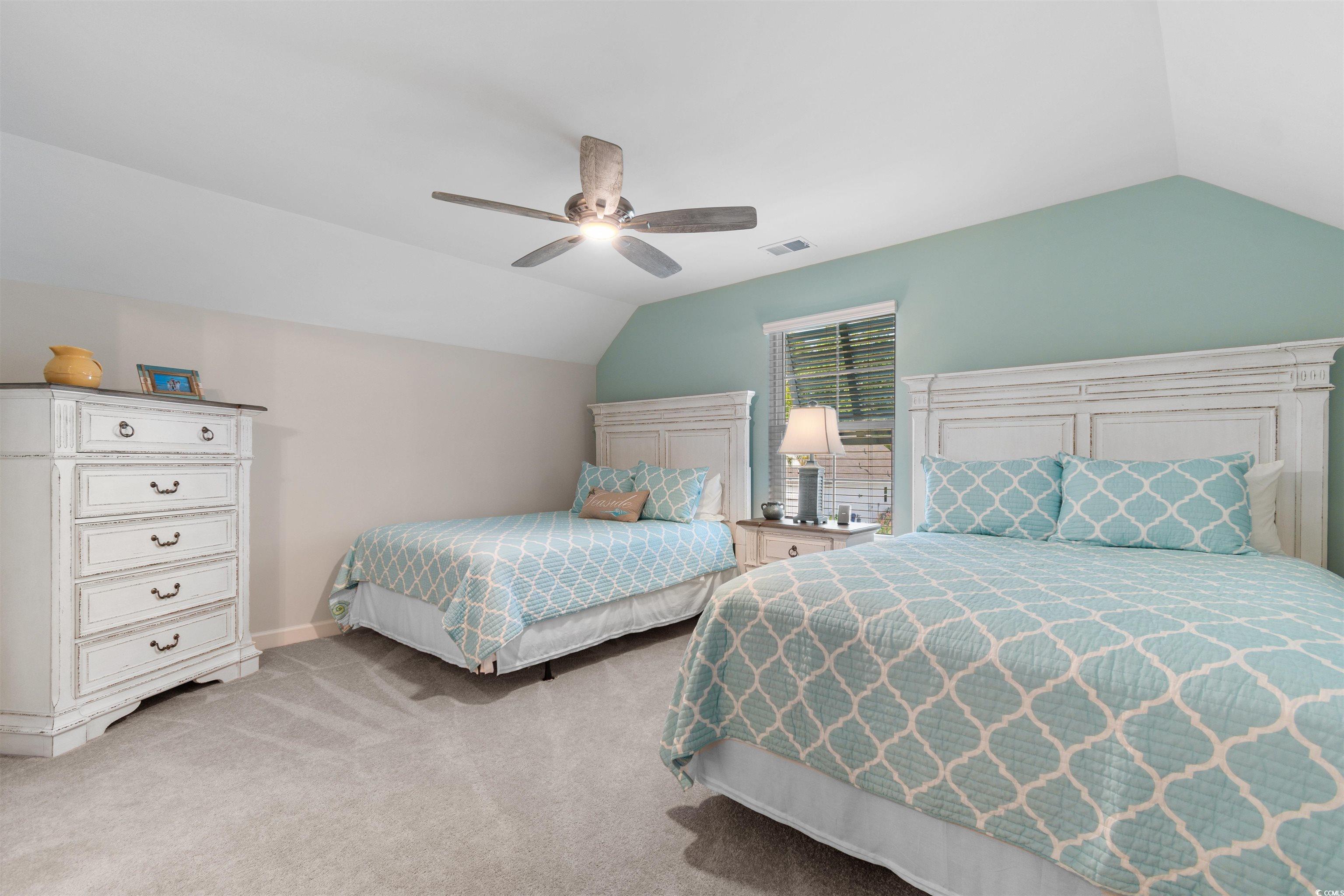 240 Sundew Loop Little River, SC 29566 - Photo 23 of 40 Bedroom featuring lofted ceiling, light carpet, and ceiling fan