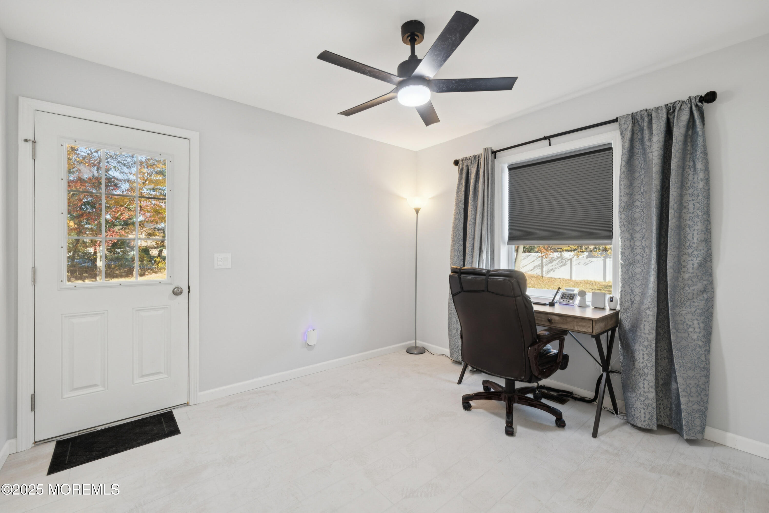 1569 Holly Road North Brunswick, NJ 08902 - Photo 21 of 29 a view of a workspace with furniture and a window