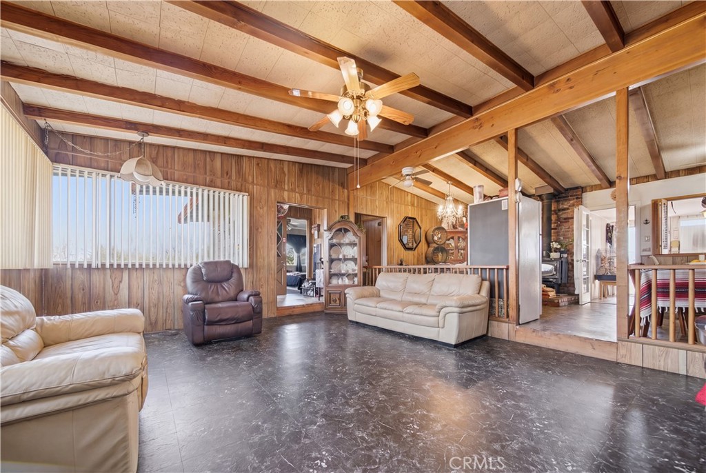 60153 Stearman Road Landers, CA 92285 - Photo 5 of 26 a view of livingroom with furniture and white walls
