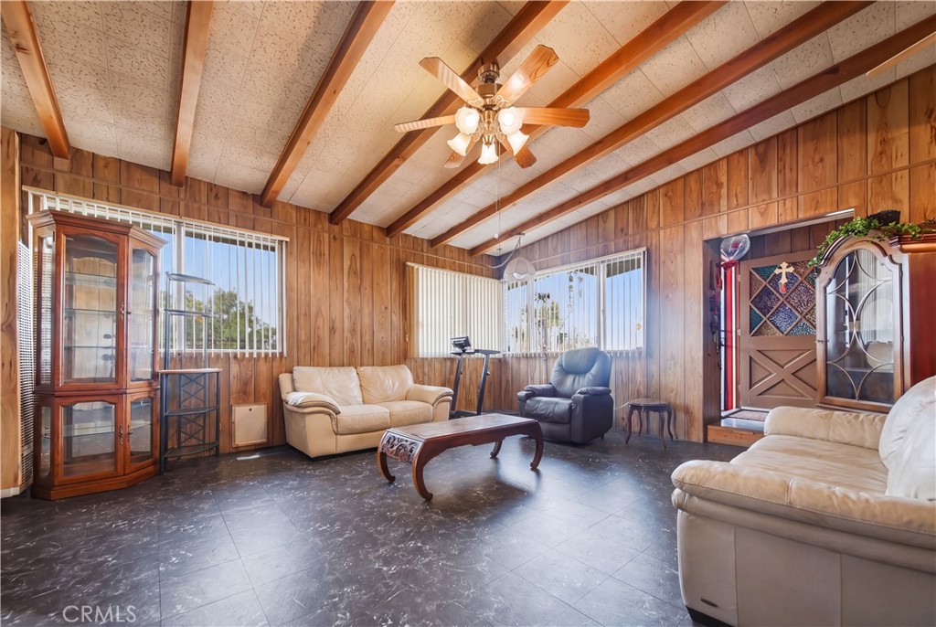 60153 Stearman Road Landers, CA 92285 - Photo 6 of 26 a living room with furniture and a large window