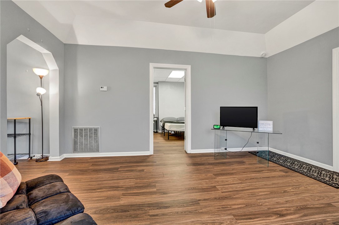 2505 East Brown Street Seneca, SC 29678 - Photo 13 of 43 This living area features a clean design with rich flooring and an inviting ambiance.