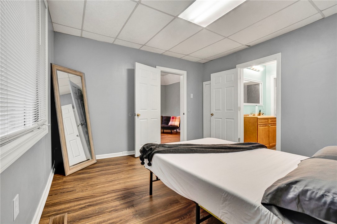 2505 East Brown Street Seneca, SC 29678 - Photo 16 of 43 This spacious bedroom offers ample natural light and direct access to a private bathroom.