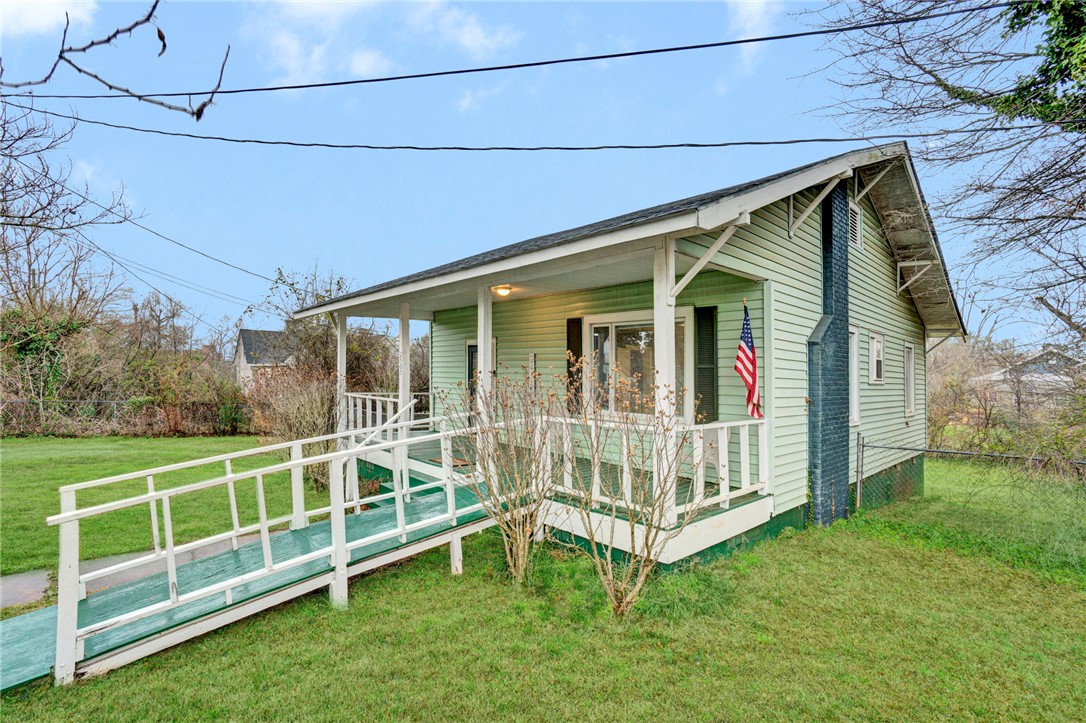 2505 East Brown Street Seneca, SC 29678 - Photo 2 of 43 This charming home features a welcoming porch and accessible ramp.