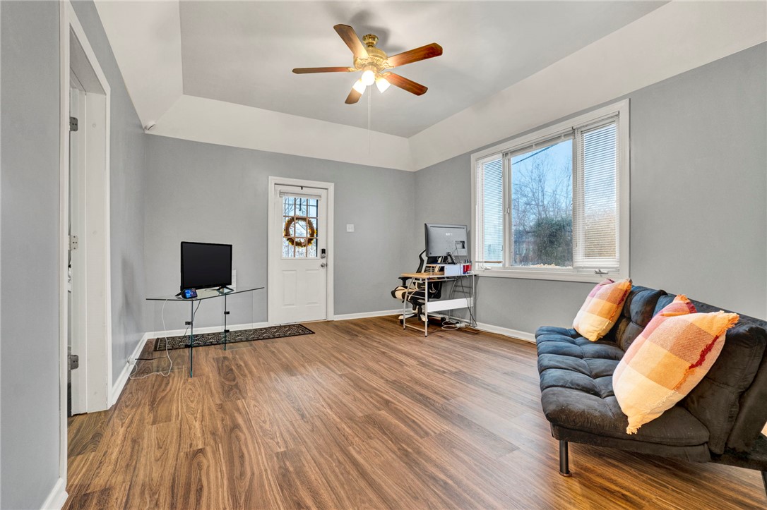 2505 East Brown Street Seneca, SC 29678 - Photo 22 of 43 This bright living space features durable wood flooring and ample natural light.