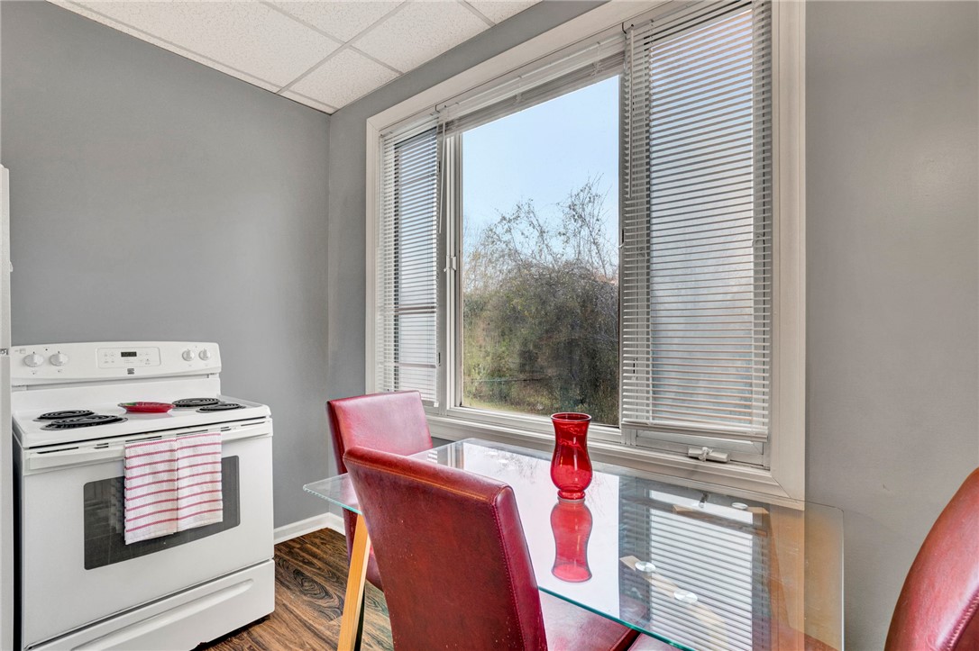 2505 East Brown Street Seneca, SC 29678 - Photo 27 of 43 This bright kitchen features a large window, creating a perfect spot for casual dining.