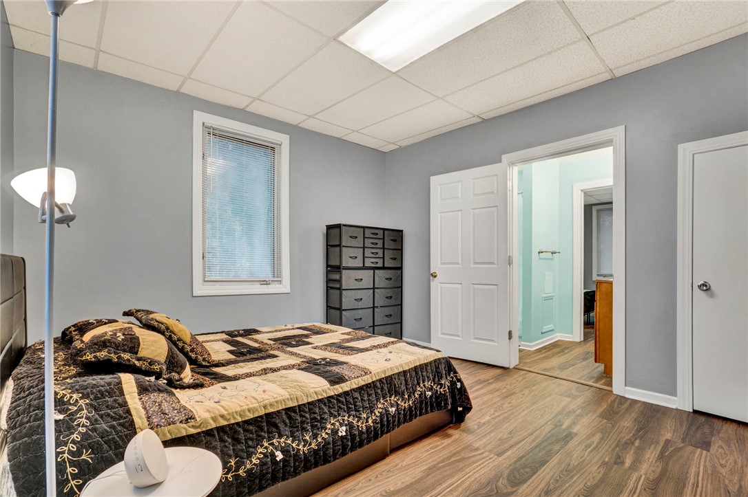 2505 East Brown Street Seneca, SC 29678 - Photo 31 of 43 This cozy bedroom features durable flooring and convenient access to a private bathroom.