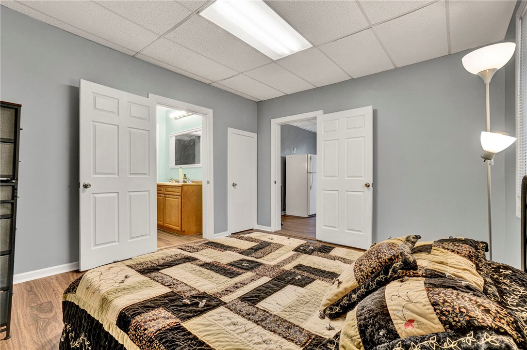 2505 East Brown Street Seneca, SC 29678 - Photo 33 of 43 This cozy space features durable flooring and convenient access to a private bathroom.