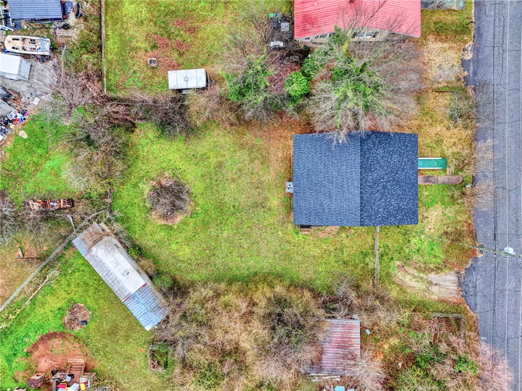 2505 East Brown Street Seneca, SC 29678 - Photo 41 of 43 An aerial view captures the property's layout, showcasing its green expanse and surrounding landscape.