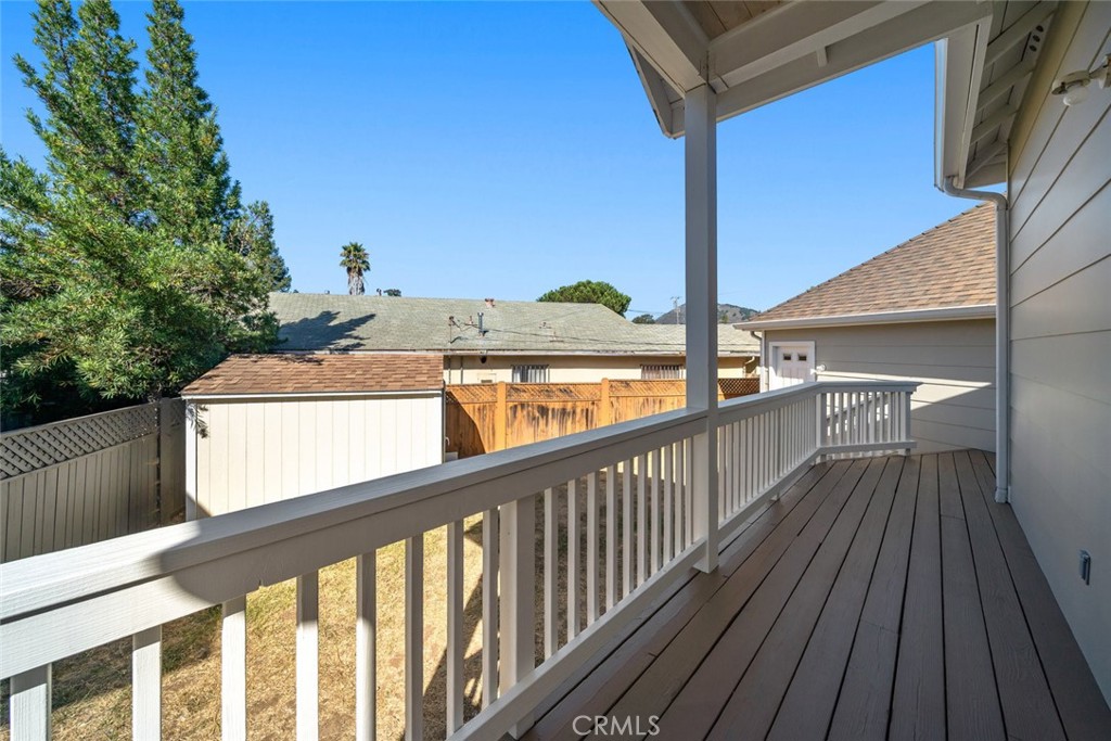 2265 Broad Street San Luis Obispo, CA 93401 - Photo 13 of 39 a view of balcony with wooden floor and fence