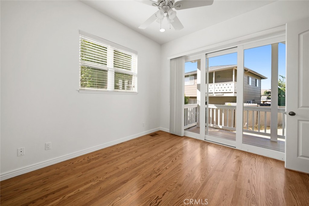 2265 Broad Street San Luis Obispo, CA 93401 - Photo 22 of 39 a view of an empty room with a window and wooden floor