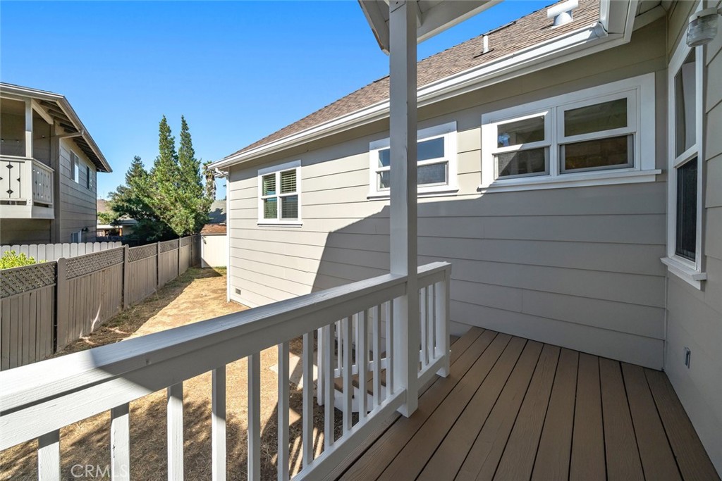 2265 Broad Street San Luis Obispo, CA 93401 - Photo 24 of 39 a view of a balcony with wooden floor and fence