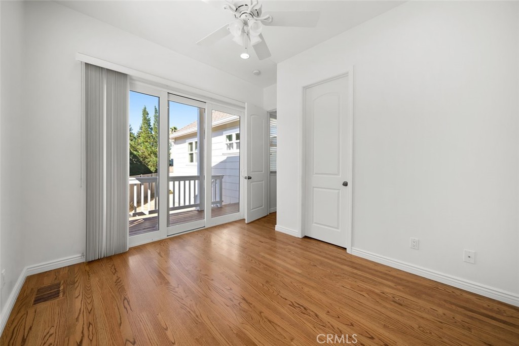 2265 Broad Street San Luis Obispo, CA 93401 - Photo 27 of 39 wooden floor in an empty room with a window