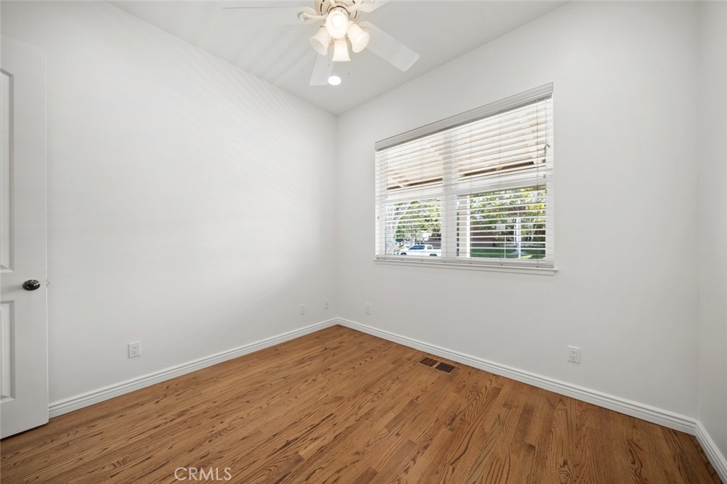 2265 Broad Street San Luis Obispo, CA 93401 - Photo 32 of 39 an empty room with wooden floor and windows
