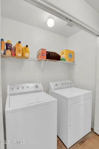 a bathroom with a shower and a bath tub