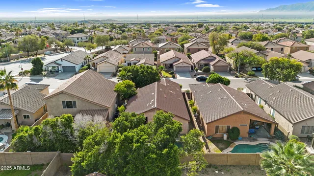 an aerial view of a house with a outdoor space