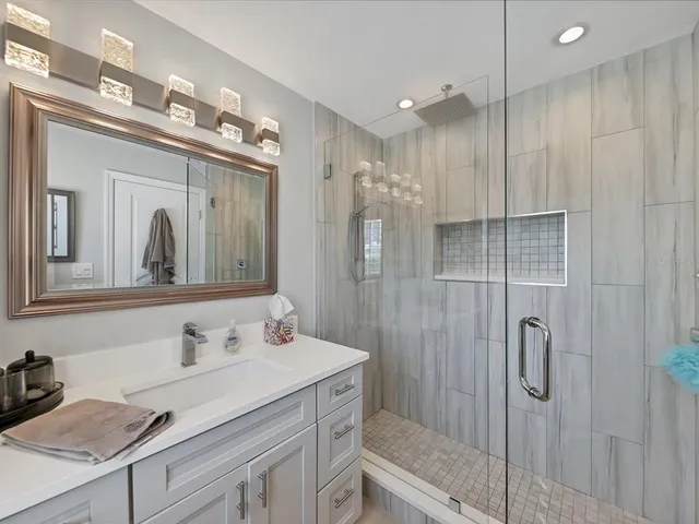 a view of a lake with sitting area