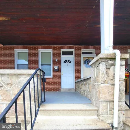 a view of entrance with stairs