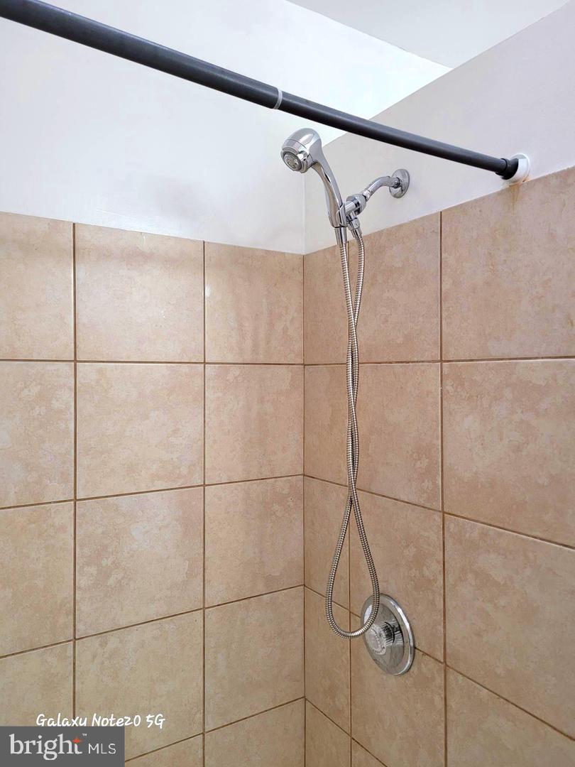 5632 Belair Road Baltimore, MD 21206 - Photo 22 of 32 a bathroom with a shower
