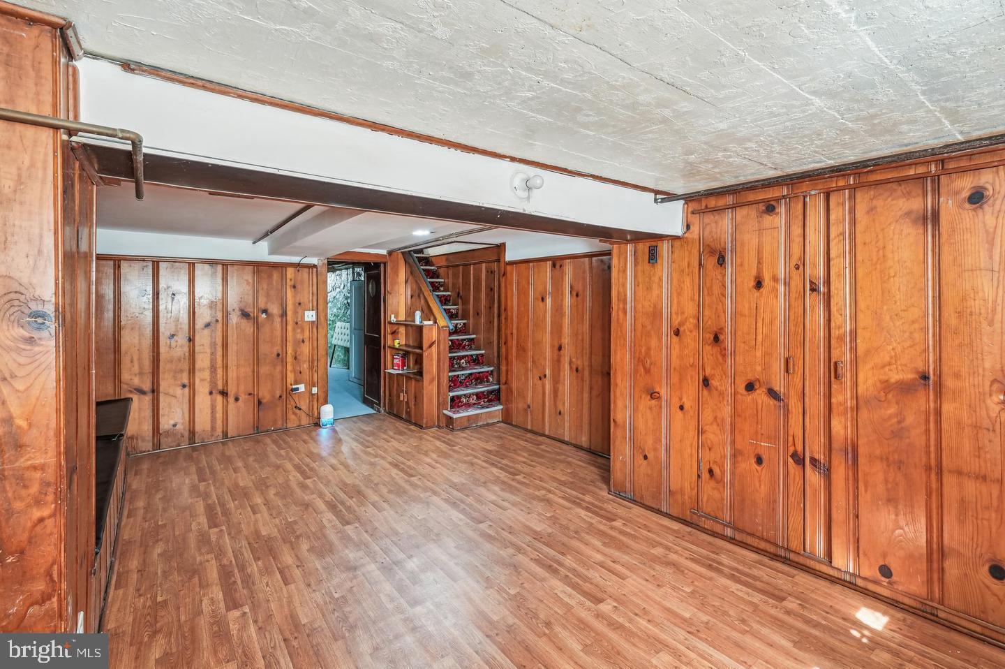 5632 Belair Road Baltimore, MD 21206 - Photo 29 of 32 a view of an empty room with wooden floor