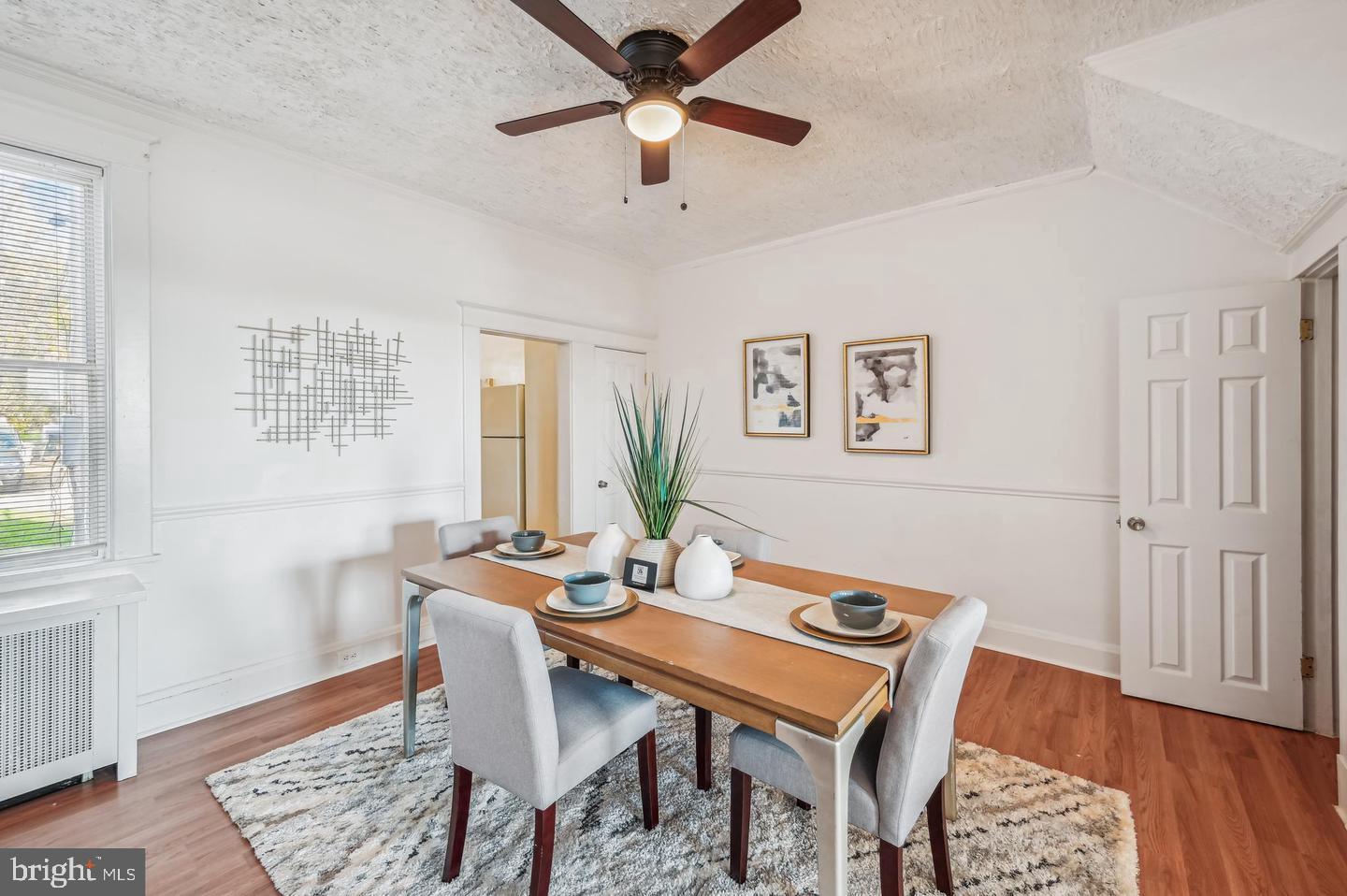 5632 Belair Road Baltimore, MD 21206 - Photo 7 of 32 a dining room with furniture and wooden floor