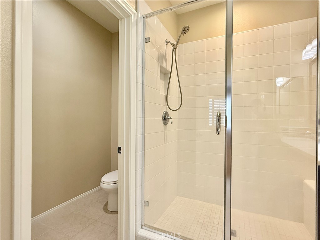 467 Raya Lane Brea, CA 92823 - Photo 12 of 30 a bathroom with a shower toilet and sink