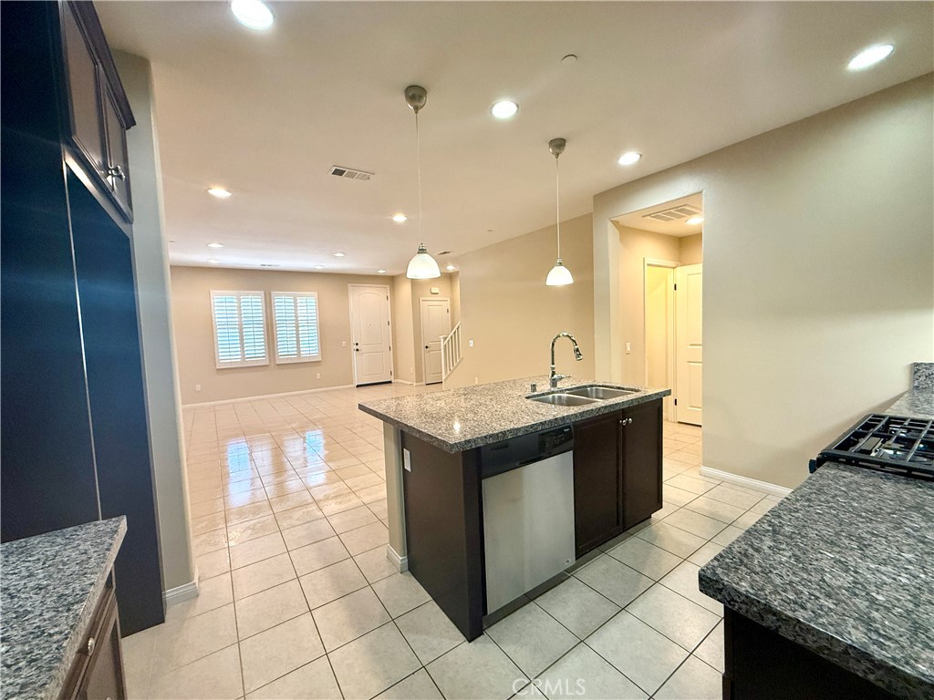 467 Raya Lane Brea, CA 92823 - Photo 4 of 30 a kitchen with a stove and a sink