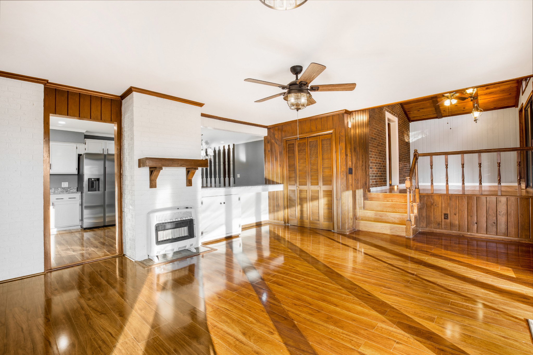 2209 Ruth Street Springfield, TN 37172 - Photo 16 of 31 a living room with stainless steel appliances kitchen island furniture and a view of kitchen