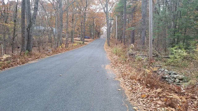a view of a backyard of the house