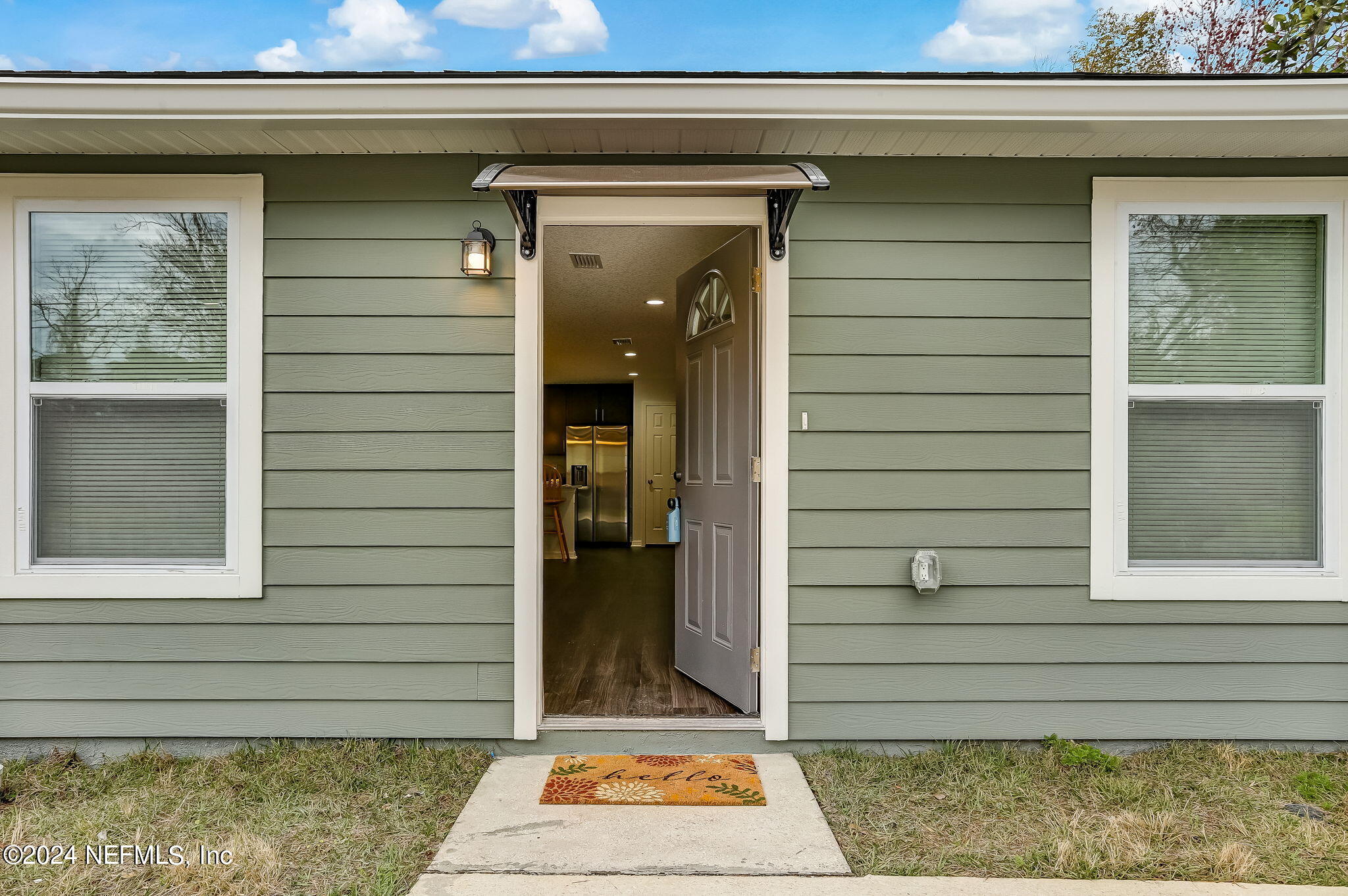 655 Moore Street Baldwin, FL 32234 - Photo 5 of 34 Front of Reference Home
