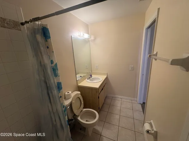 a bathroom with a sink and toilet